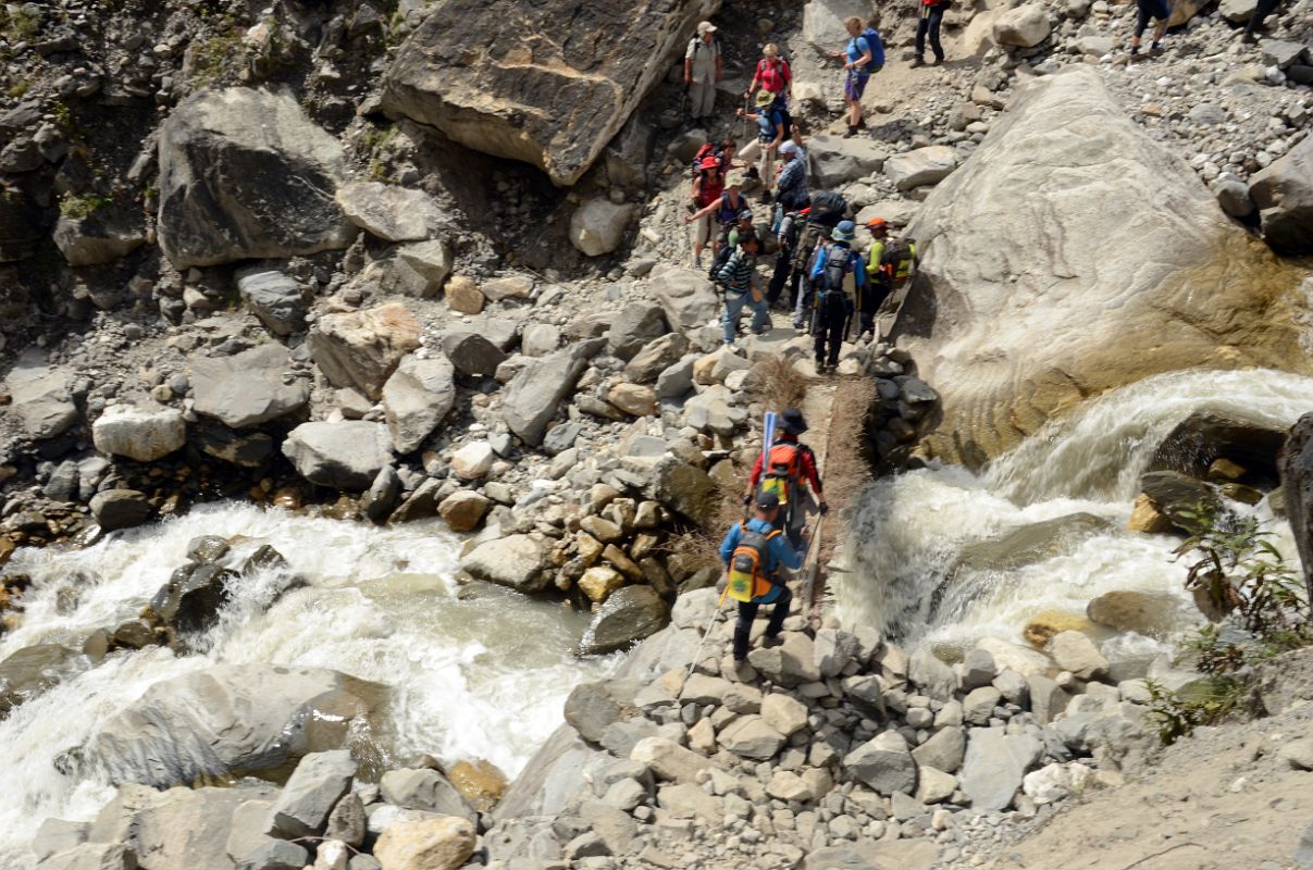 27 Crossing A Stream Between Hinku Cave And Deurali On Trek To Annapurna Sanctuary 